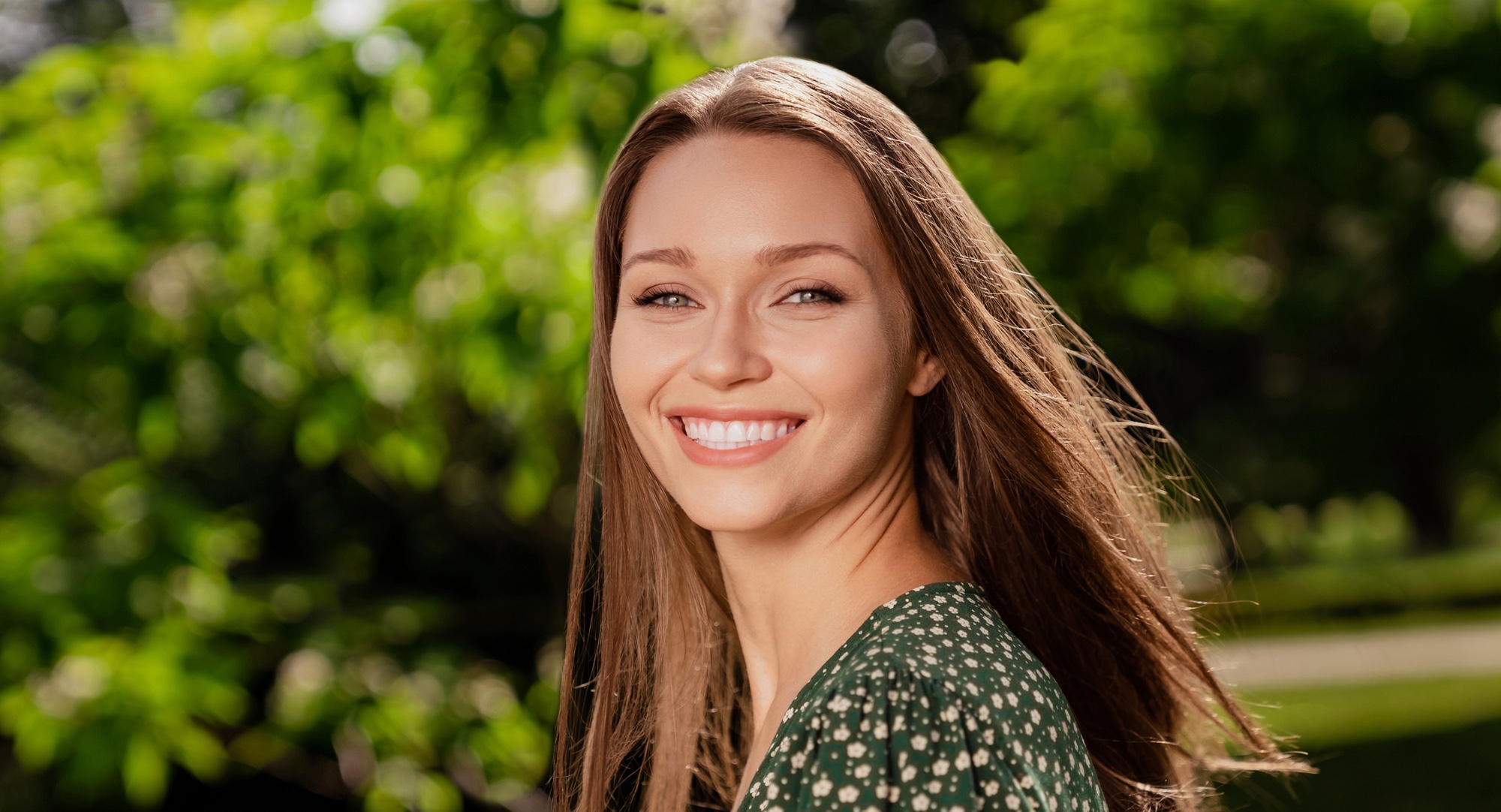 Photo of pretty, young cheerful woman after JUVÉDERM® dermal fillers