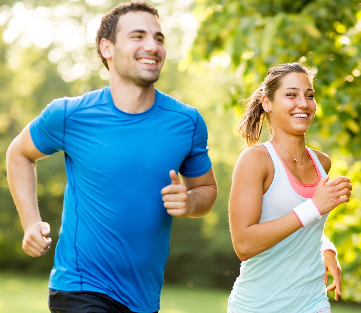 Young couple running after body contouring treatments