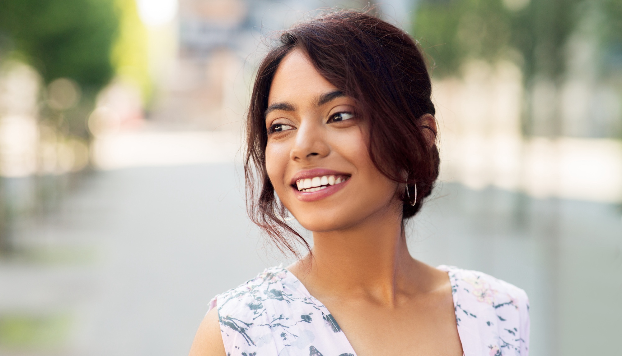 Photo of a happy woman with radiant skin after chemical peels