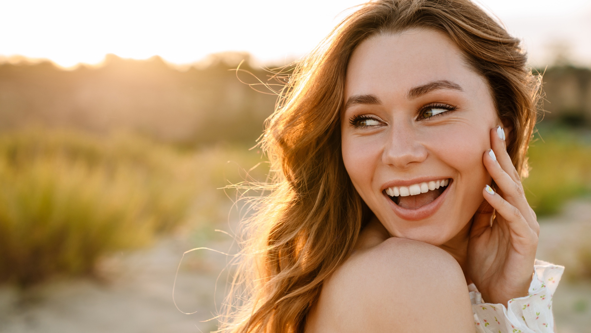Photo of a smiling woman with great skin after VI Peels