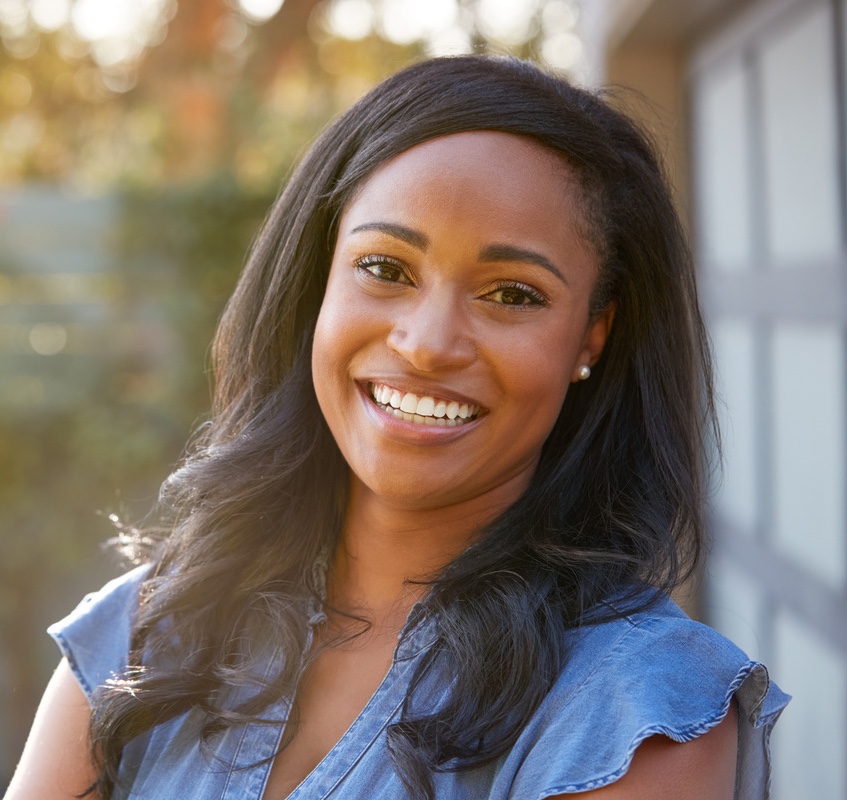 Portrait of a smiling woman after HydraFacial™ treatments