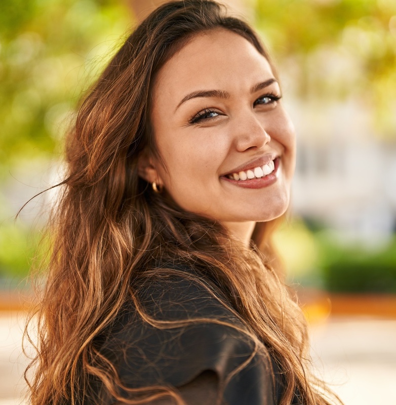 Young beautiful hispanic woman smiling confident standing at park